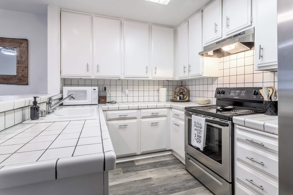 Kitchen comes fully stocked with everything needed to cook a nice meal.