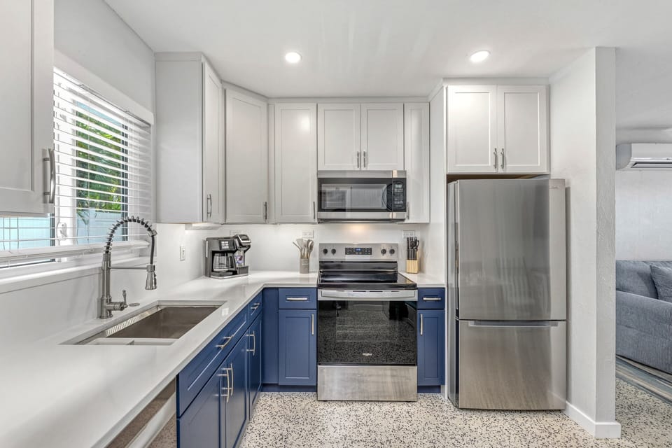 Clean, modern kitchen with ample counter space and storage.