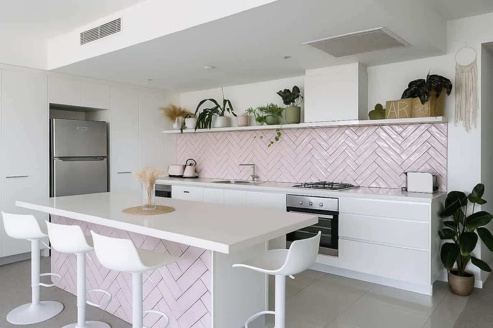Bright kitchen with breakfast bar seating