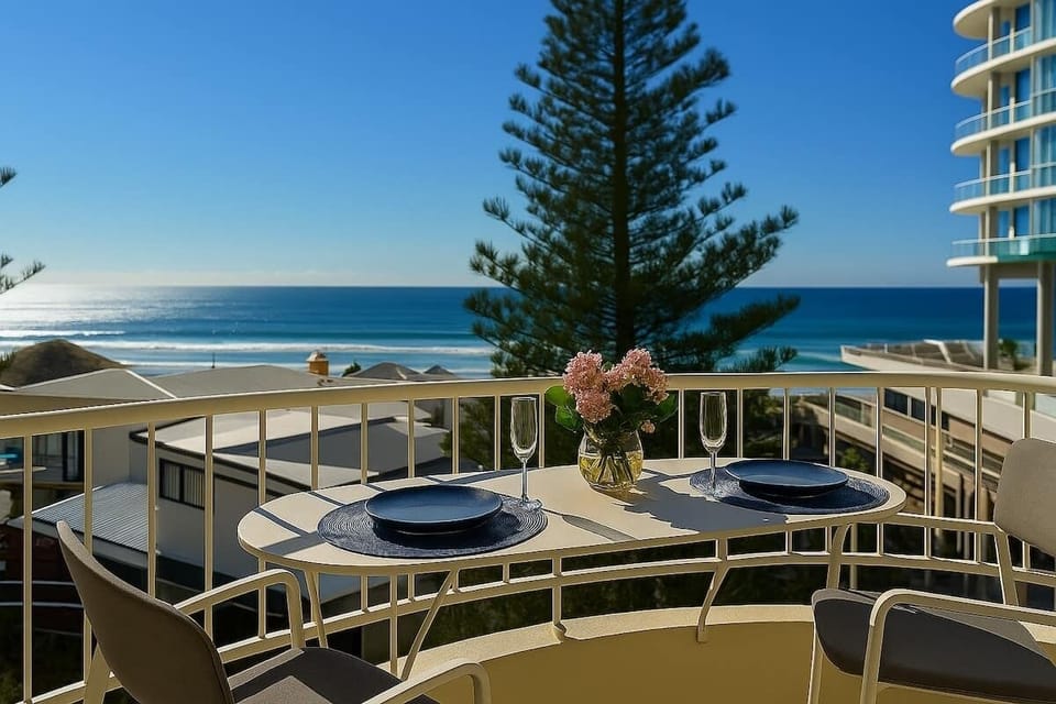 Balcony Dining with Ocean View – Dine al fresco on the private balcony with direct ocean outlook.