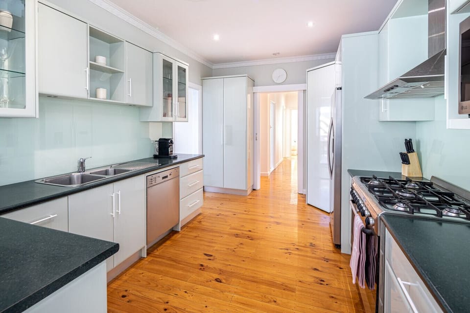Cook with ease in a well-equipped kitchen designed for gathering and even long-stays.