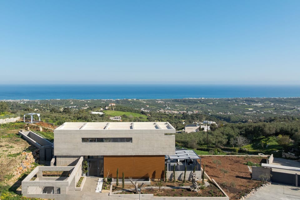 Esse Villa rests in complete seclusion in Maroulas, set on a 1,300 m² sea-view p