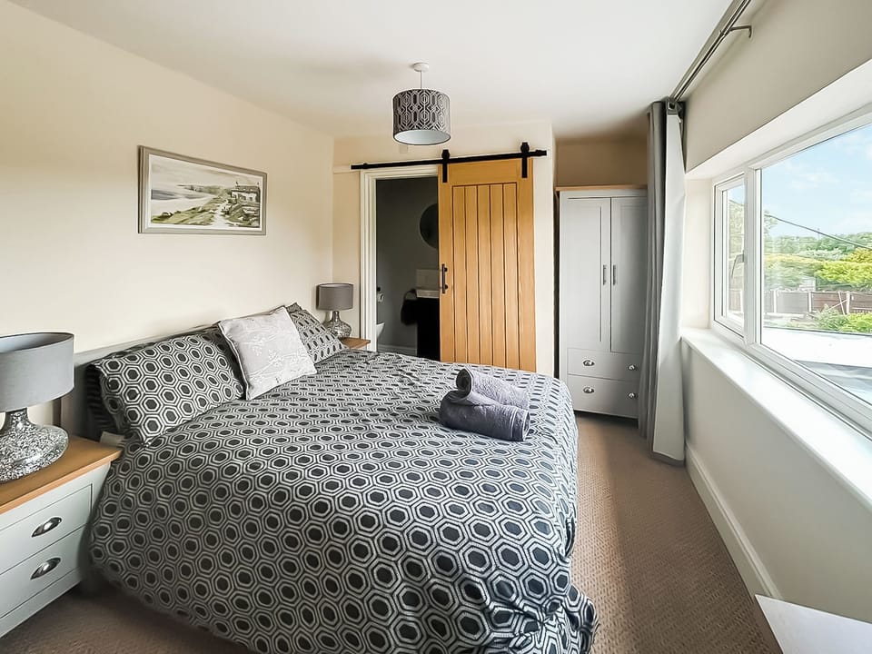 Master bedroom with ensuite | Ayr Cottage, Prestatyn
