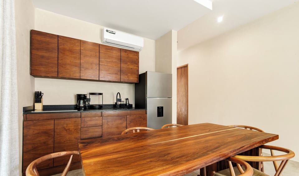Deluxe Apartment, Garden View | Private kitchen | Fridge, microwave, stovetop, cookware/dishes/utensils