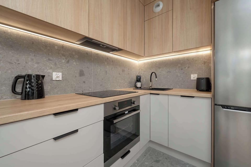 The fully equipped kitchenette includes everything you need for a home-cooked meal.