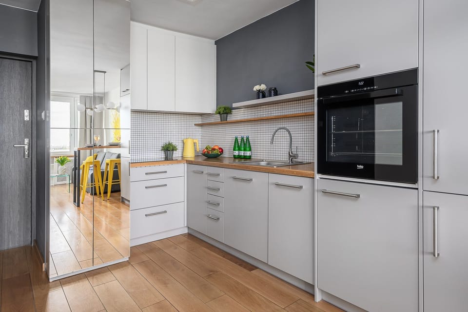 Classic Apartment, Courtyard View | Private kitchen | Electric kettle, highchair
