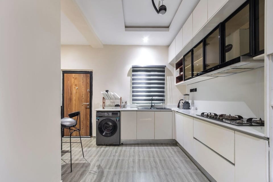 Economy Apartment, Balcony, City View | Private kitchen | Fridge, microwave, oven, stovetop