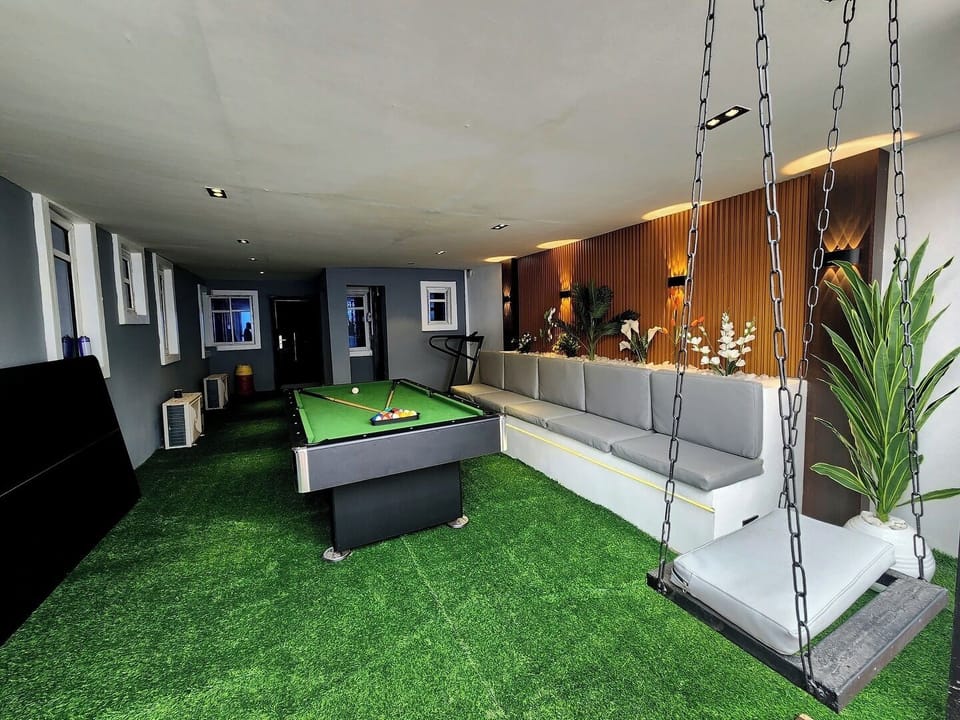 Deluxe Apartment, Balcony, City View | Game room
