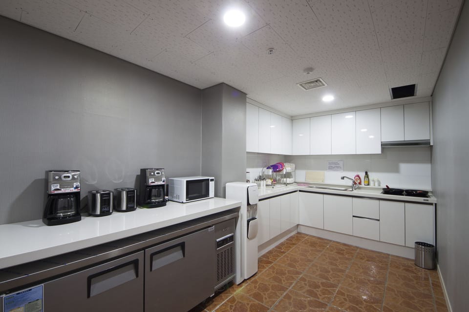 Fridge, microwave, toaster oven, cookware/dishes/utensils