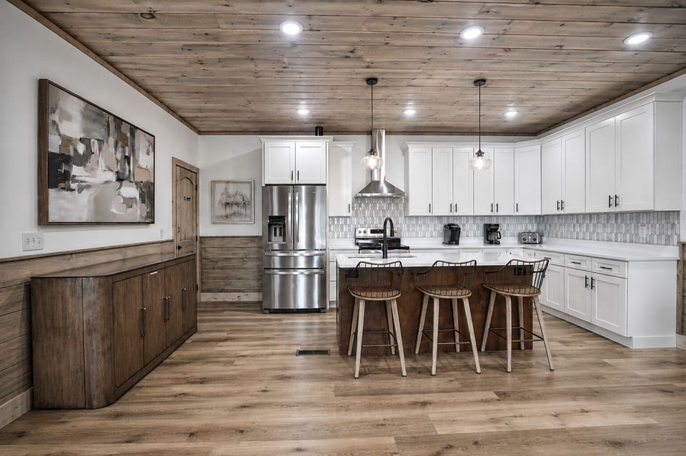 Modern mountain kitchen designed for family meals and late-night snacks.