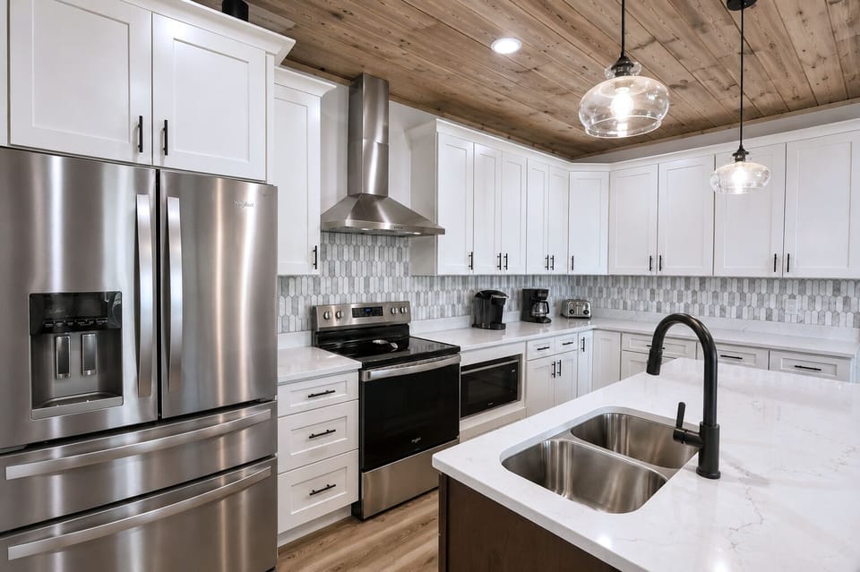 Beautifully designed kitchen featuring rustic charm and modern convenience.