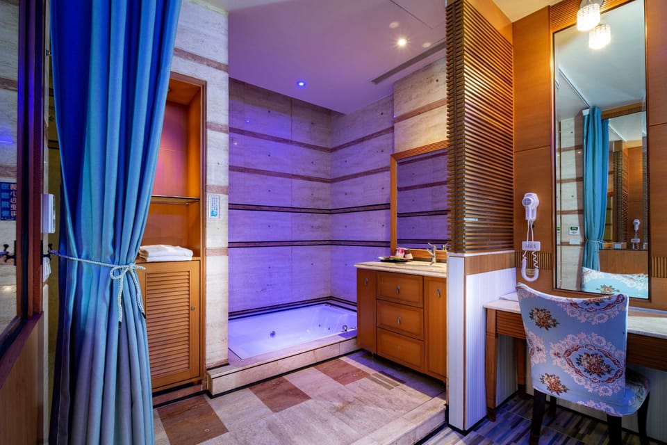 Athena | Bathroom | Free toiletries, hair dryer, slippers, towels