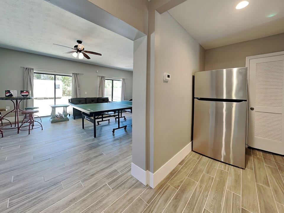 Bonus Fridge and Sink Conveniently Located Off the Game Room