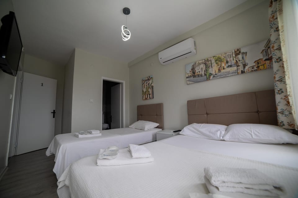 Triple Room | Premium bedding, minibar, WiFi (free)