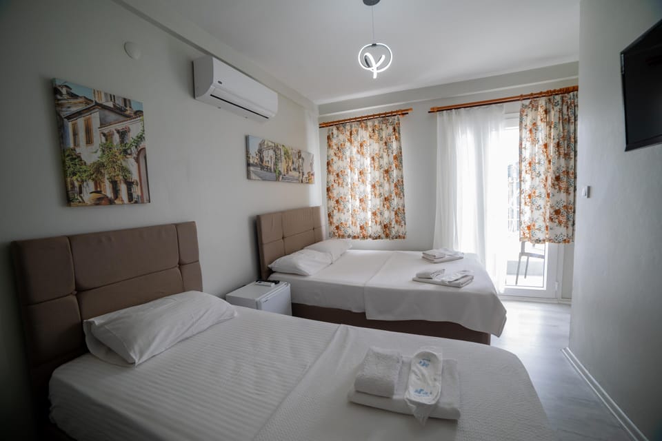 Triple Room | Premium bedding, minibar, WiFi (free)