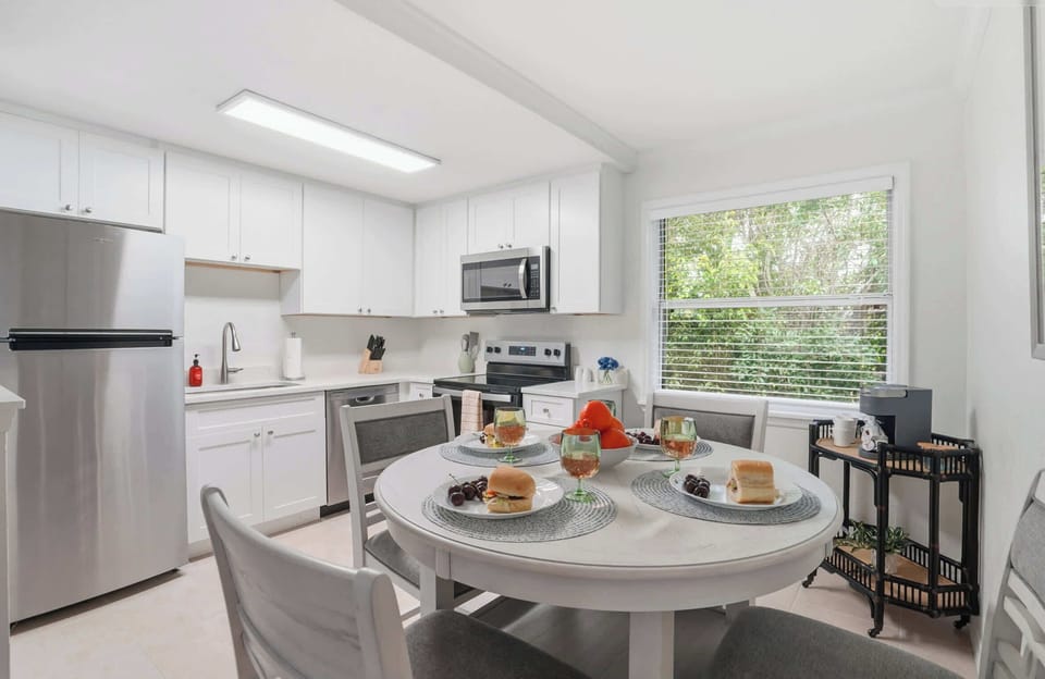Fully furnished kitchen + dedicated coffee bar for slow Sarasota mornings.