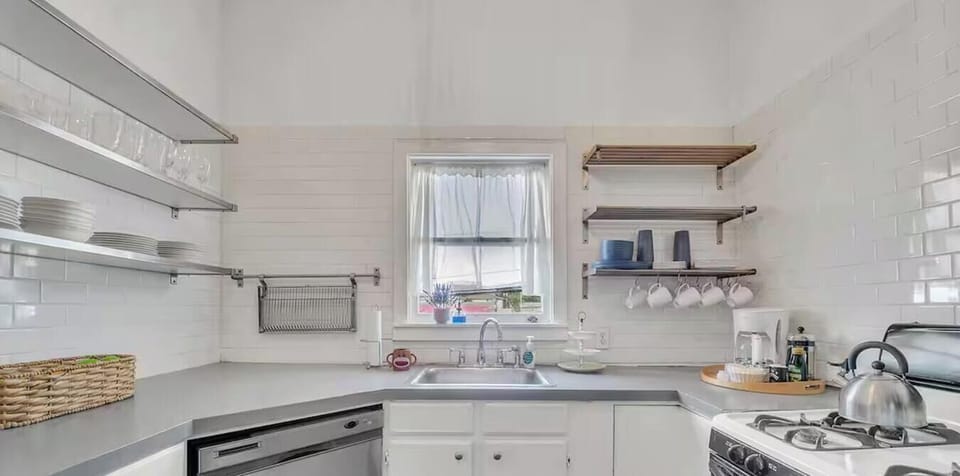 Brew your morning coffee or prep a full group dinner in this fully stocked kitchen with gas range and dishwasher.