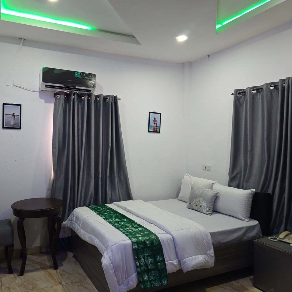 Economy Room, Balcony, City View | Desk, laptop workspace, blackout drapes, soundproofing
