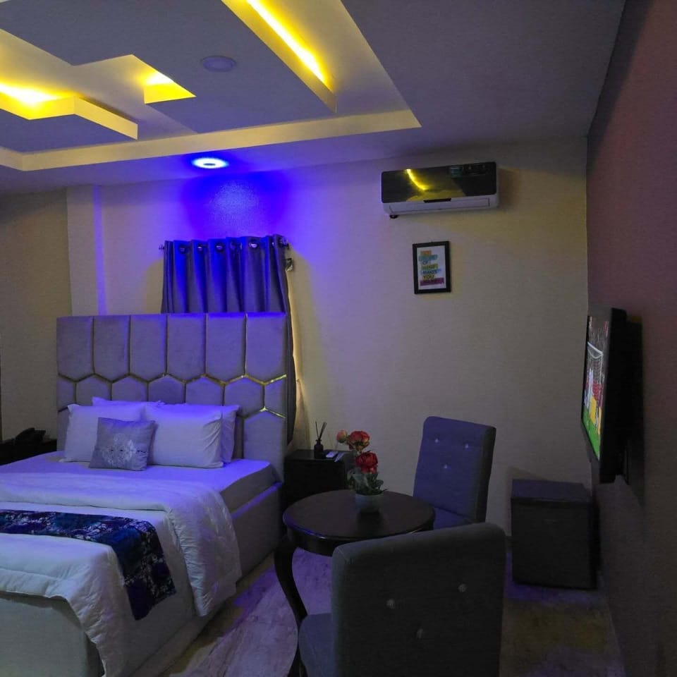 Economy Room, Balcony, City View | Desk, laptop workspace, blackout drapes, soundproofing