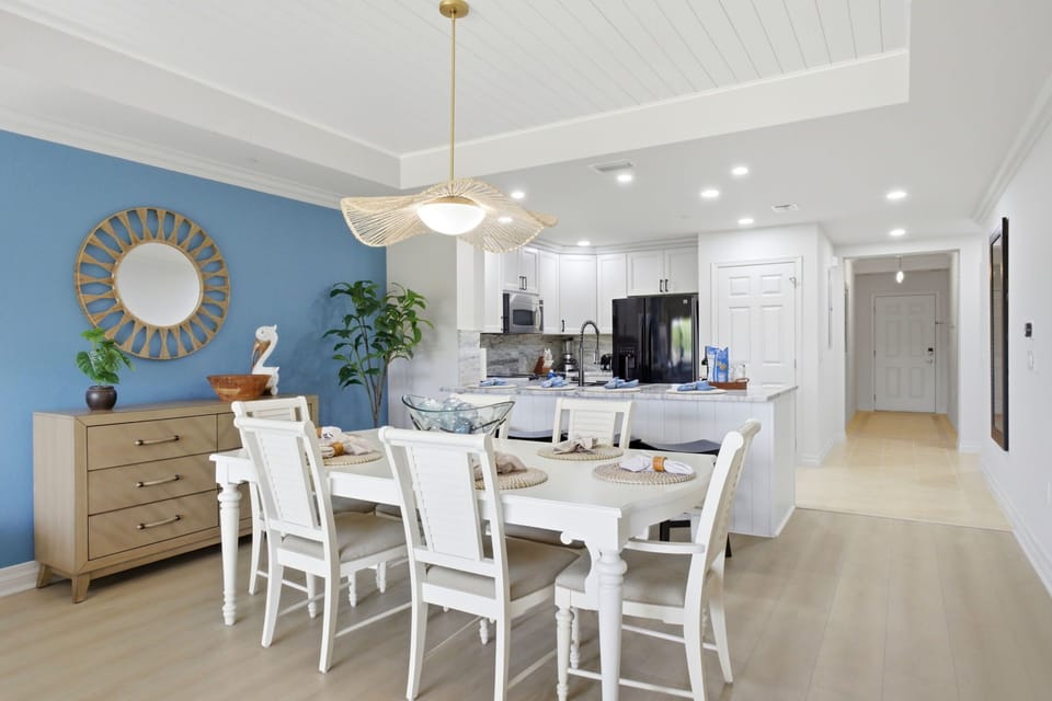 Open dining and kitchen layout designed for connection, comfort, and effortless entertaining