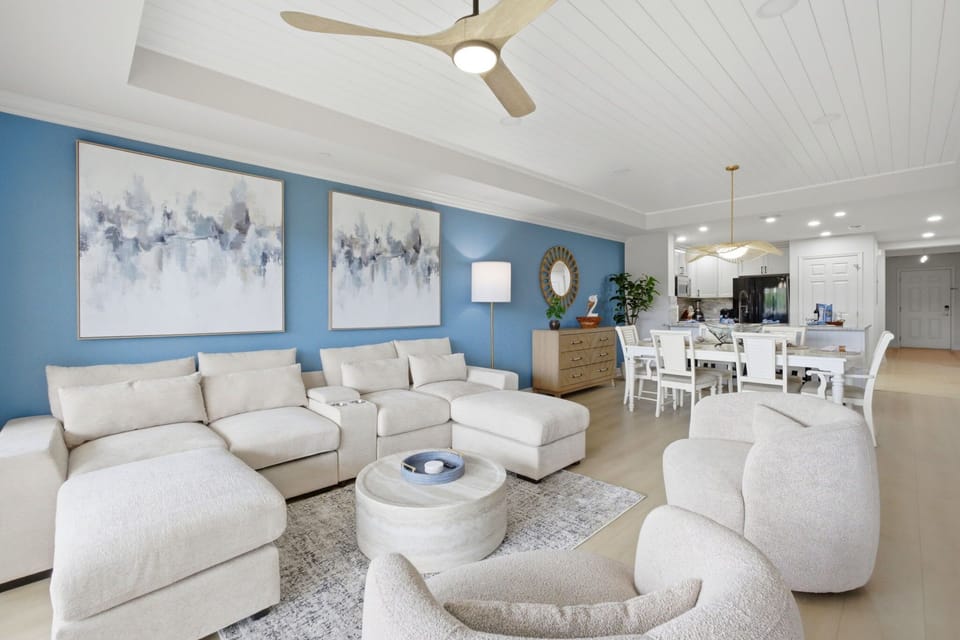 Another view of the living area highlighting the scale, layout, and high-end design touches