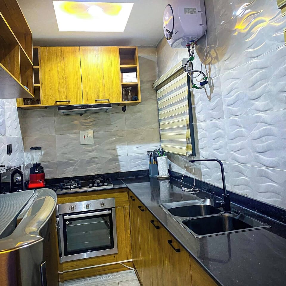 Family Room, Balcony, City View | Private kitchen | Fridge, microwave, oven, stovetop
