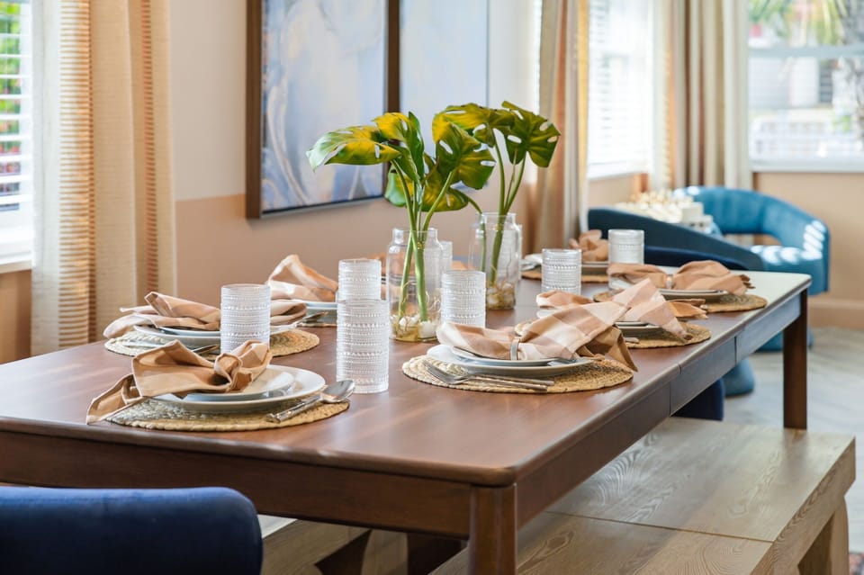Gather around this beautifully styled dining table, share a home-cooked meal, and let the warm, sun-filled atmosphere turn every dinner into a cherished vacation memory.