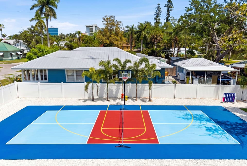 Shoot hoops, run drills, or just enjoy a friendly game under the open sky — this vibrant private basketball court is ready for some serious fun and friendly competition any time of day.