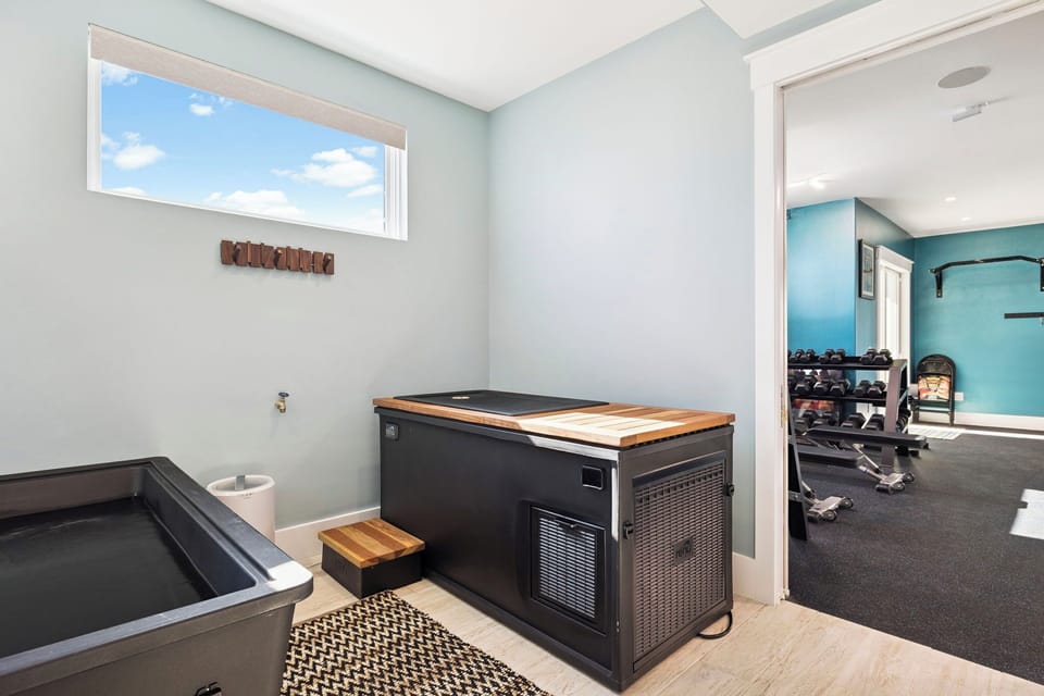 Unwind in your private spa with a luxury hot tub, while the adjacent fitness room keeps you active during your stay.