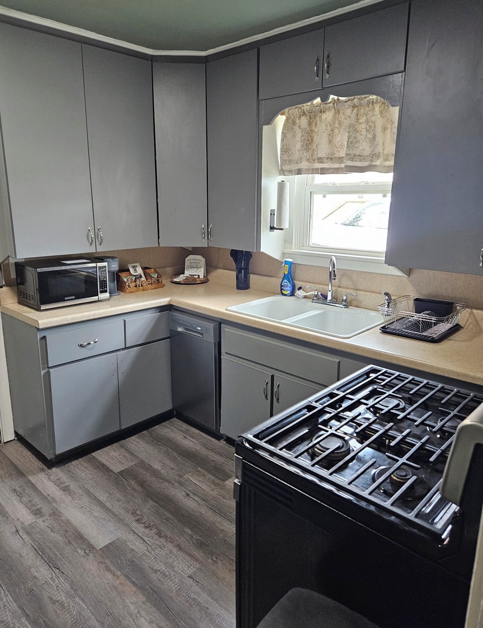 microwave, coffee/ coffee maker, stovetop, refrigerator and freezer, dishwasher