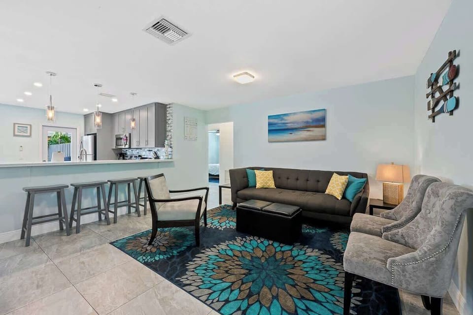 beautiful & functional living room opening into kitchen