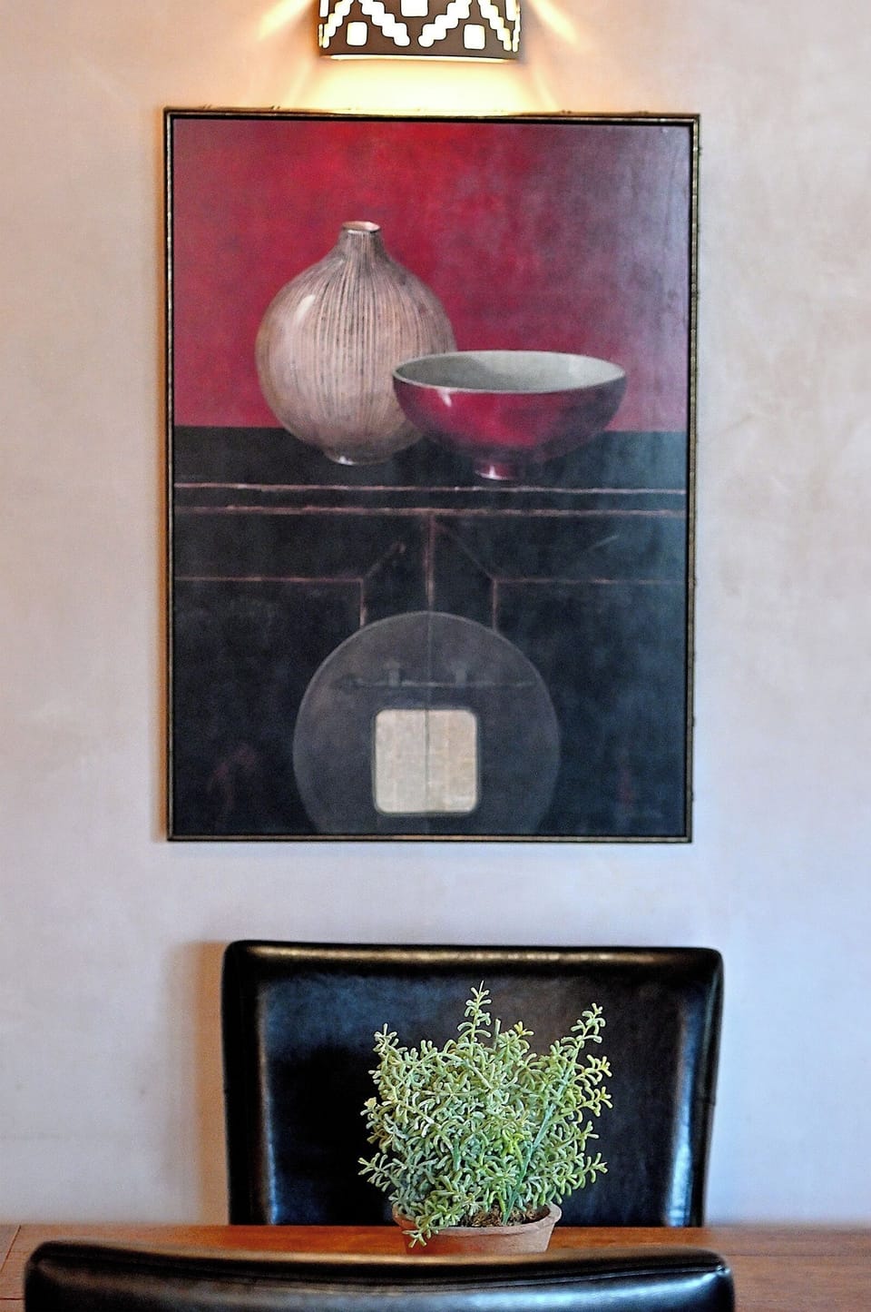 Thoughtful artwork and fresh greenery create a serene corner where you can pause and appreciate the refined touches throughout your stay.