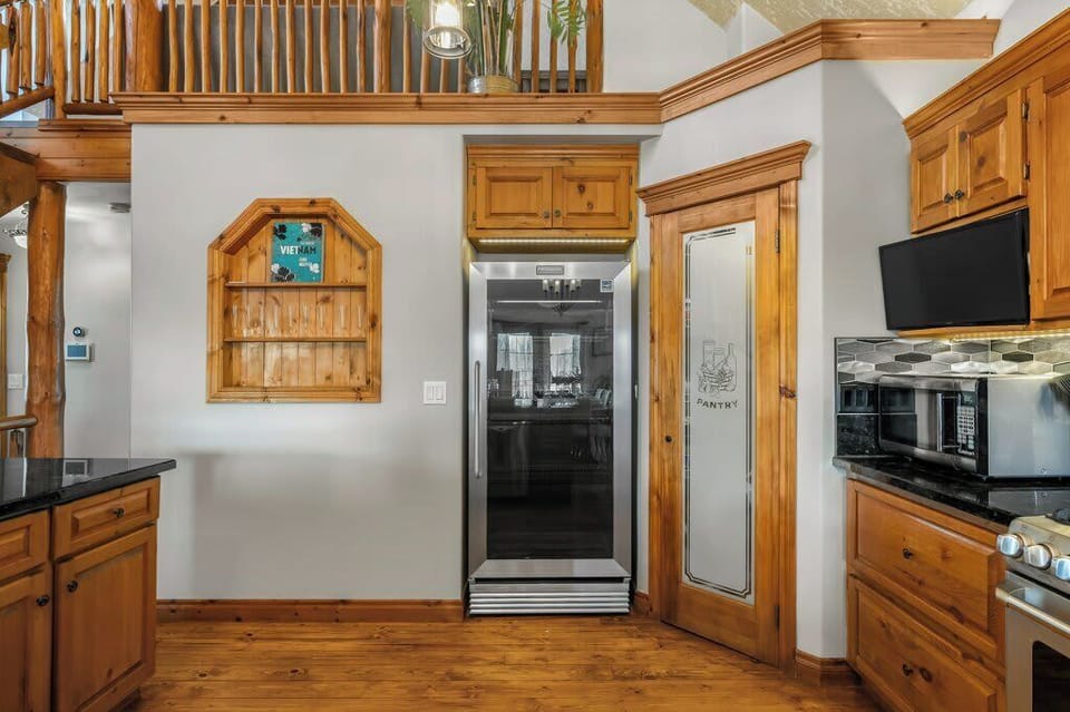 Fully equipped kitchen with gas range and modern appliances