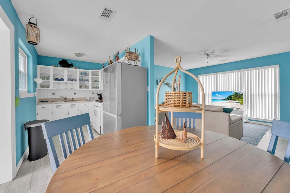 Full view of kitchen, dining and living areas