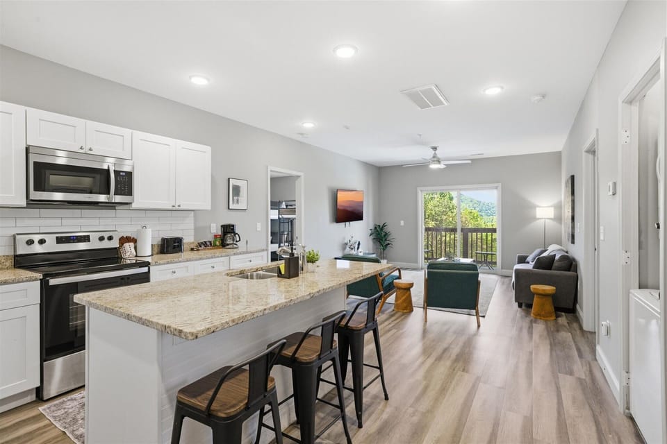 Pull up a seat in Unit 1 and stay in the mix—whether it’s coffee, snacks, or keeping the cook company, this spot keeps everything within reach and everyone connected.
