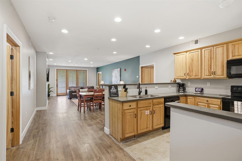 From the entry of Unit 712, the space opens into the kitchen, dining, and living areas, creating a smooth, connected layout that feels open and welcoming right away.