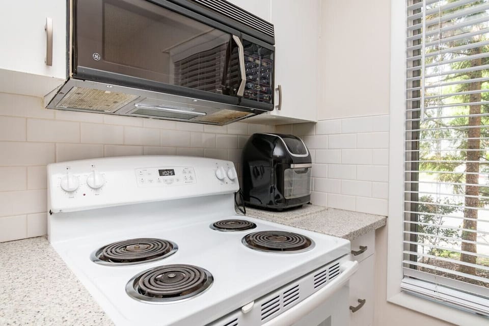 Fully equipped kitchen with everything needed for easy holiday meals, snacks, and morning coffee before heading out to explore.
