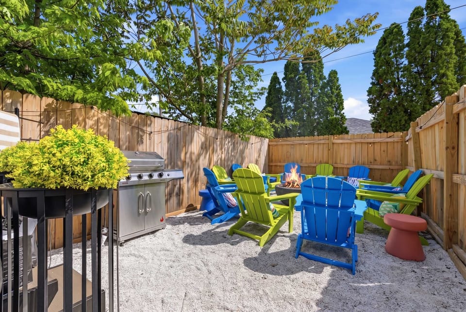 Experience the best of outdoor living in our curated backyard. Whether you’re grilling up a feast or sharing stories around the fire pit, this secluded space is the heart of relaxation.