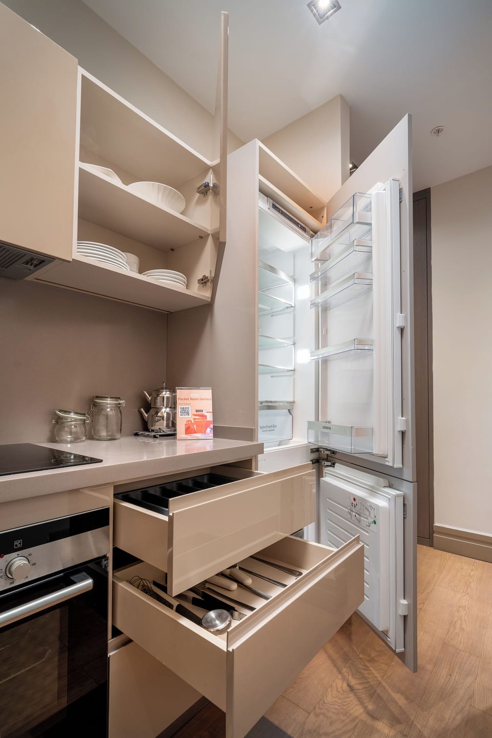 Fridge, coffee/tea maker, cookware/dishes/utensils