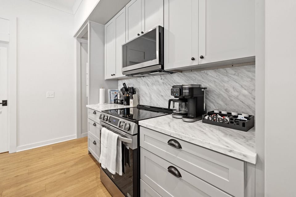 Kitchen with coffee maker and everyday essentials