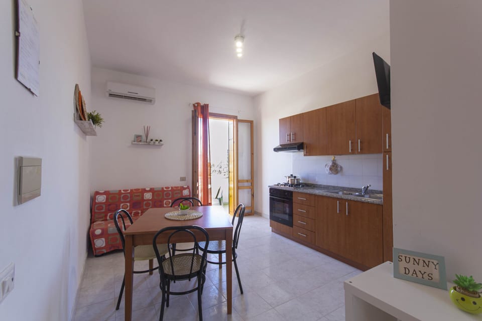 Apartment, Balcony (Bilocal) | Living area | 32-inch LCD TV with digital channels, TV
