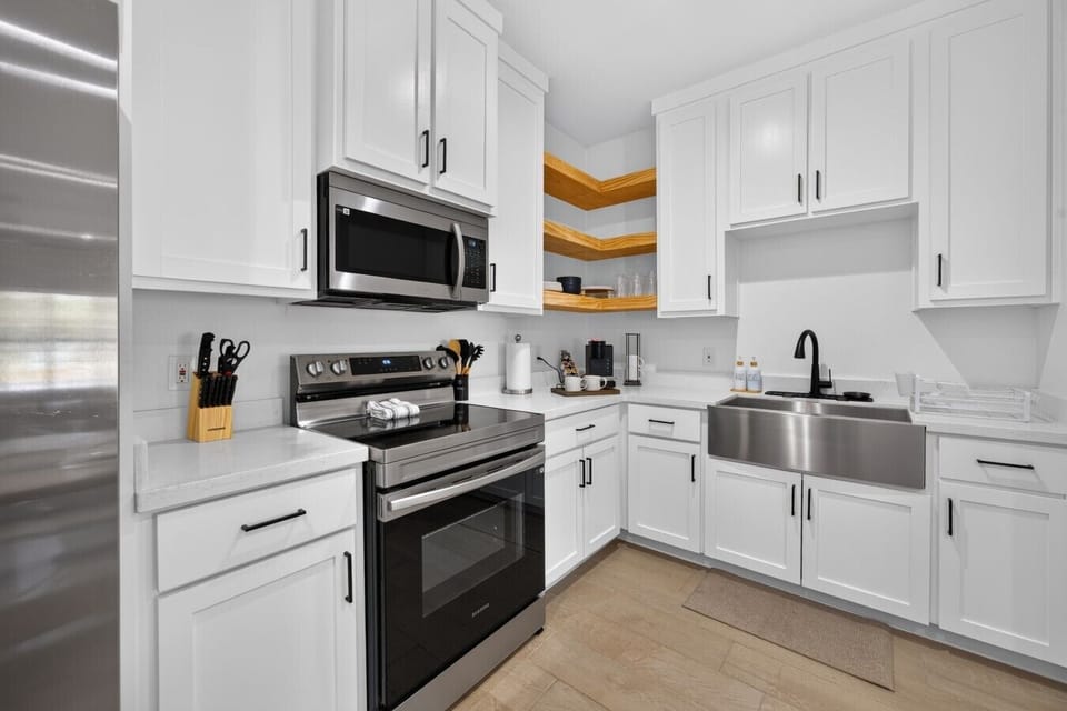 Kitchen | Electric Range & Coffee Station | Stainless Steel Appliances