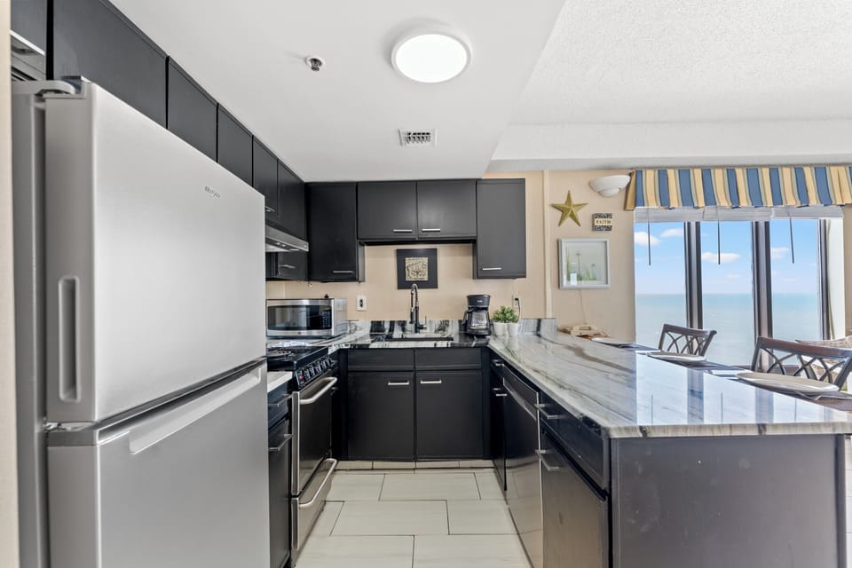 Basic Studio, Balcony, Ocean View (1104) | Private kitchen | Full-size fridge, microwave, oven, stovetop