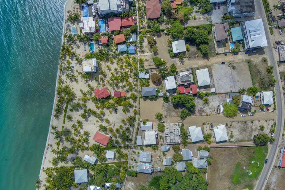 Drone image showing house location, distance from beach and road