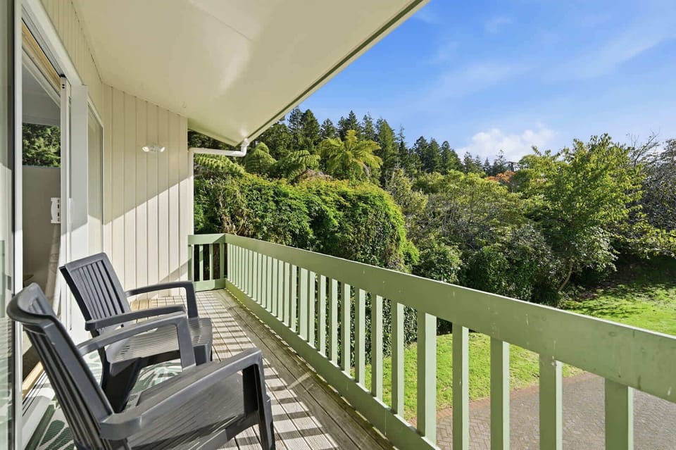 Covered deck with garden views
