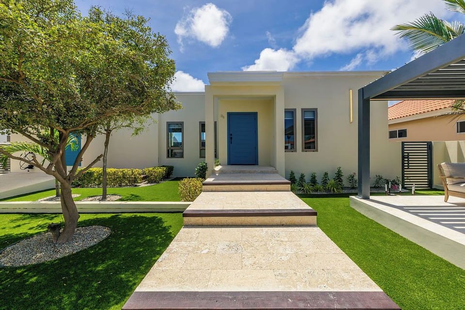 Stylish home with private entrance, secure gate, and landscaped yard. Perfect for a peaceful and private getaway.