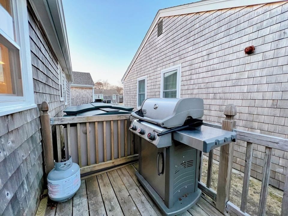 Small deck with weber grill (there is no backyard)