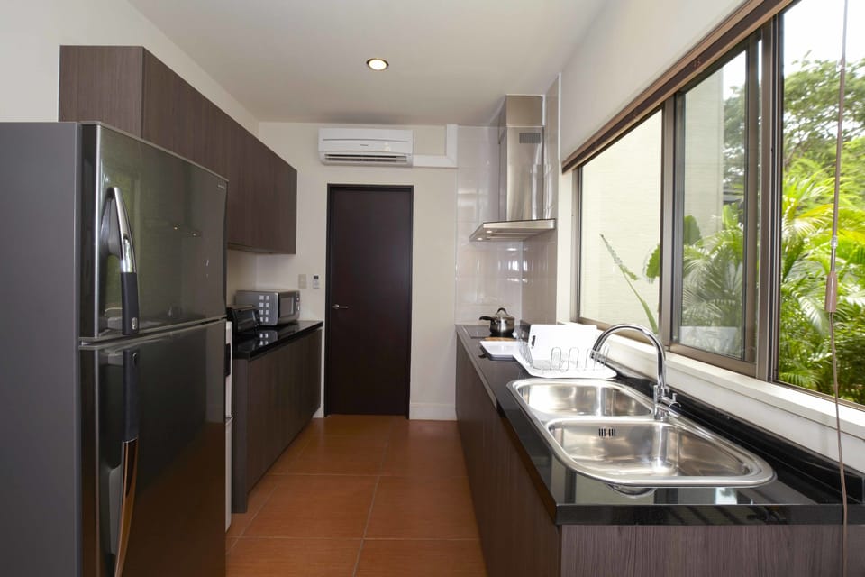 Villa | Private kitchenette | Fridge, microwave, electric kettle, cookware/dishes/utensils
