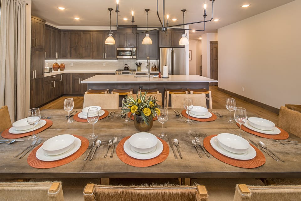 Dining area with open kitchen layout | Main Level