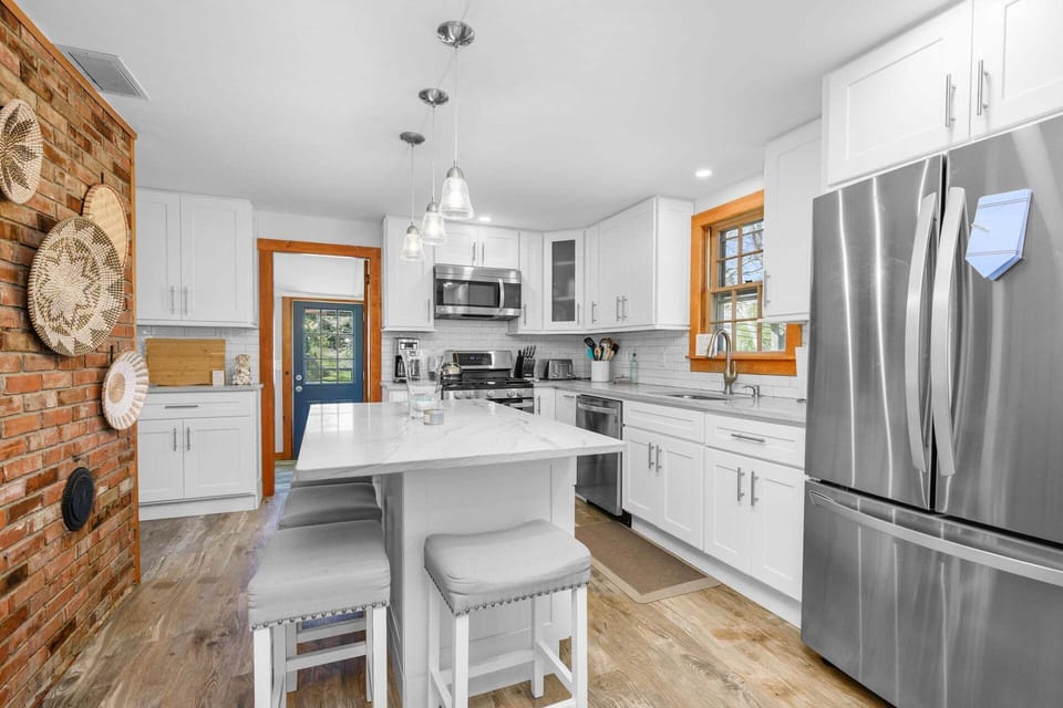 Modern kitchen with sleek finishes and updated appliances